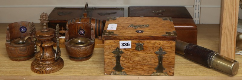 A collection of smoking and drinking paraphernalia including cigar boxes, ashtrays and bottle openers